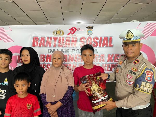 polres bintan bawa sembako ke panti asuhan Anak Panti Tersenyum Haru! Polisi Bintan Bawa Bantuan dan Ajak Tertib Lalu Lintas Sejak Dini!