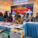 Polisi Ungkap Gudang Miras Ilegal, 8.644 Botol Disita dan SS Ditetapkan Tersangka dan Lai Cung Diburu Polisi